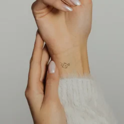 Tatouages Petit | Tatouages Petit^PAUL HEWITT Goldfish Tattoo