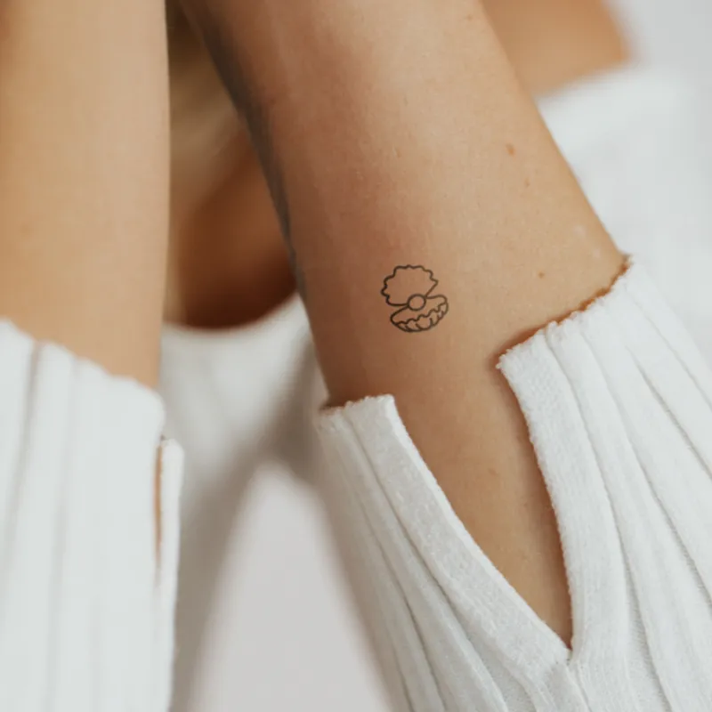Tatouages Petit | Tatouages Petit^PAUL HEWITT Pearl Tattoo