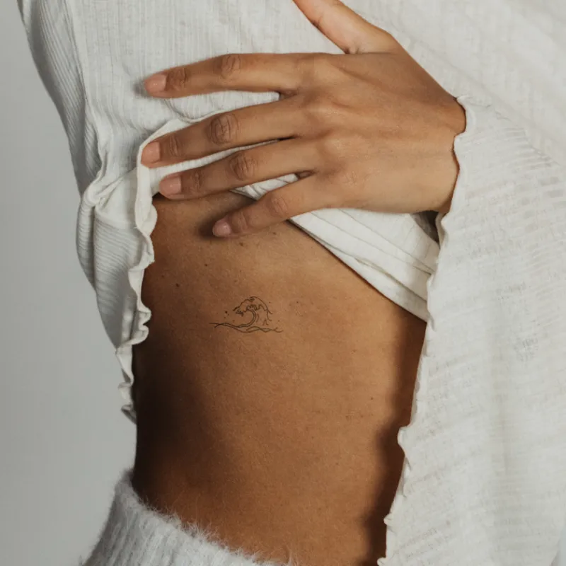 Tatouages Medium | Tatouages Medium^PAUL HEWITT Wave Tattoo